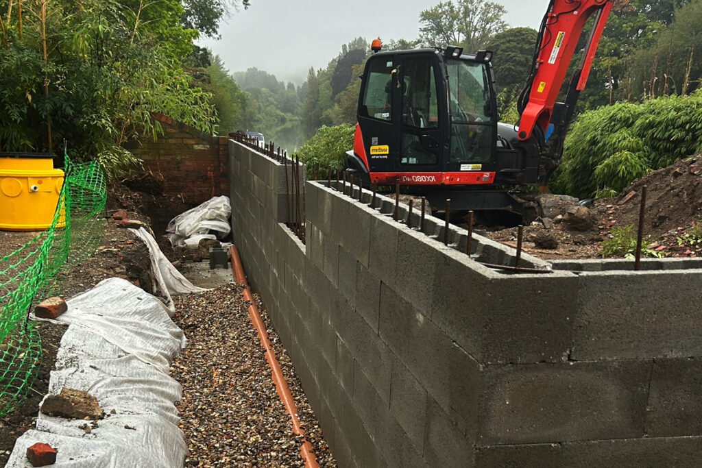 Stepoc flood defence wall, Stepoc blocks, Retaining Wall Cost and Type Comparison Guide UK